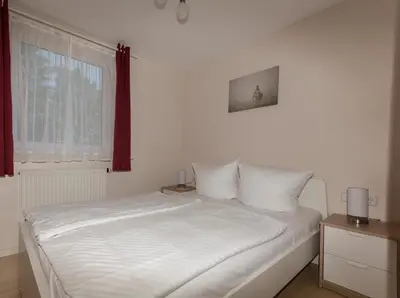 Ein Bett oder Betten in einem Zimmer der Unterkunft Ferienhaus Großtrappe im Sternenpark