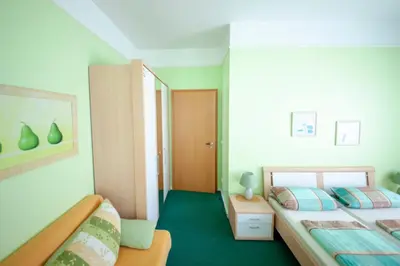Ein Bett oder Betten in einem Zimmer der Unterkunft Hotel und Appartementhaus Rheden