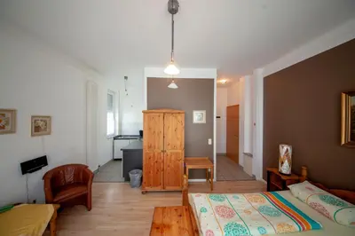 Ein Bett oder Betten in einem Zimmer der Unterkunft Hotel und Appartementhaus Rheden
