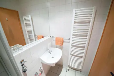 Ein Badezimmer in der Unterkunft Hotel und Appartementhaus Rheden