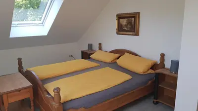 Ein Bett oder Betten in einem Zimmer der Unterkunft Hotel und Appartementhaus Rheden