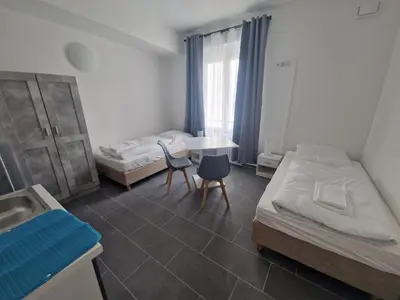 Ein Bett oder Betten in einem Zimmer der Unterkunft BusinessQuartier Berlin