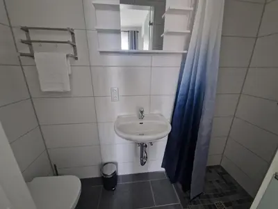 Ein Badezimmer in der Unterkunft BusinessQuartier Berlin