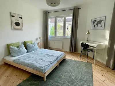 Ein Bett oder Betten in einem Zimmer der Unterkunft DeNe Living Apartments