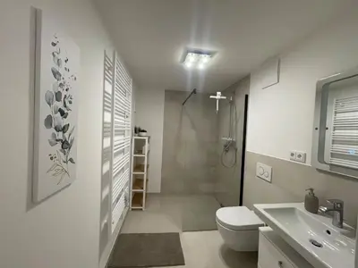 Ein Badezimmer in der Unterkunft Luxurious and stylish apartment at BER Airport