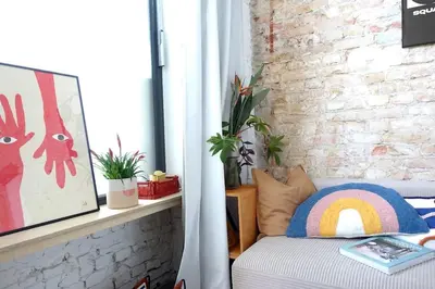 Ein Bett oder Betten in einem Zimmer der Unterkunft Neue Architektur Wohnung in Mitte - Beste Lage
