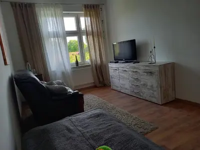TV/Unterhaltungsangebot in der Unterkunft Wohnung für bis zu 4 Monteure in der Nähe von Fehrbellin