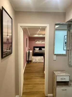 Ein Bett oder Betten in einem Zimmer der Unterkunft 3 Personen Apartment im Zentrum