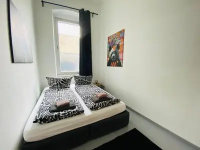 Ein Bett oder Betten in einem Zimmer der Unterkunft Gemütliche 2-Zimmer Wohnung mit kleinen Bad