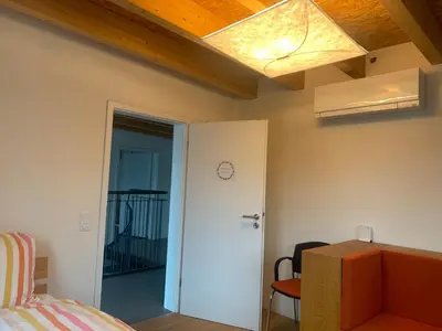 Ein Bett oder Betten in einem Zimmer der Unterkunft A cozy room in a modern House