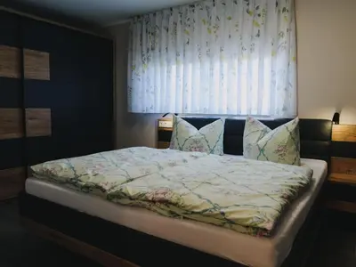Ein Bett oder Betten in einem Zimmer der Unterkunft Ferienhaus in Lübben am Spreeufer