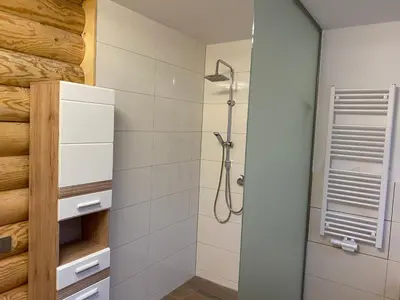 Ein Badezimmer in der Unterkunft Blockhausvermietung Himmelpfort