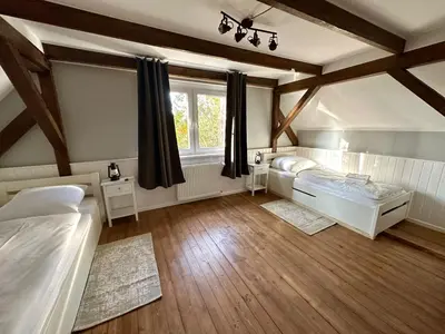 Ein Bett oder Betten in einem Zimmer der Unterkunft LANDHAUS by Comfort Housing - up to 7 guests