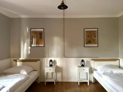 Ein Bett oder Betten in einem Zimmer der Unterkunft LANDHAUS by Comfort Housing - up to 7 guests