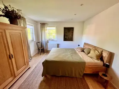 Ein Bett oder Betten in einem Zimmer der Unterkunft Landhaus Himmelpfort
