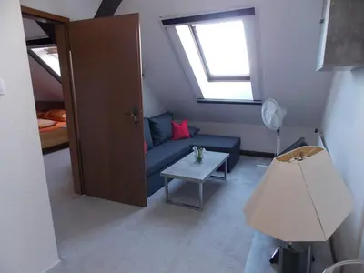 Ein Sitzbereich in der Unterkunft Ferienwohnung Mohnblume
