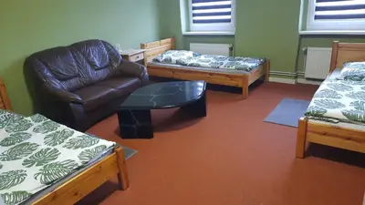 Ein Bett oder Betten in einem Zimmer der Unterkunft FEWO2-1 Zim Apart-5 Bett-Küche-Dusche WC-Parkplatz