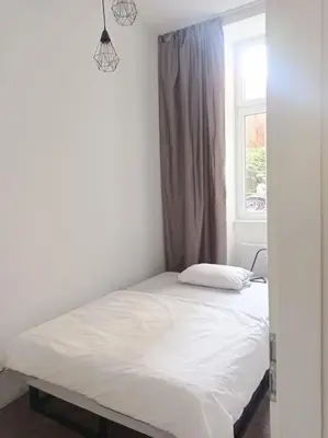Ein Bett oder Betten in einem Zimmer der Unterkunft Loft nahe Schloss Charlottenburg