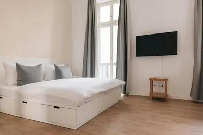 Ein Bett oder Betten in einem Zimmer der Unterkunft Frankfurter Allee Apartments by Sabine