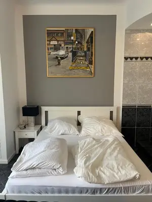 Ein Bett oder Betten in einem Zimmer der Unterkunft King David Garden