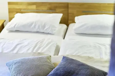 Ein Bett oder Betten in einem Zimmer der Unterkunft Sanddornhaus