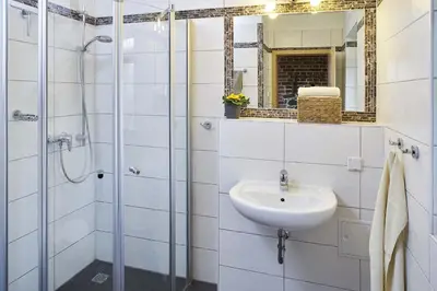 Ein Badezimmer in der Unterkunft Sanddornhaus