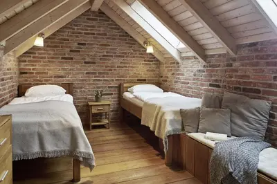 Ein Bett oder Betten in einem Zimmer der Unterkunft Lindenhaus