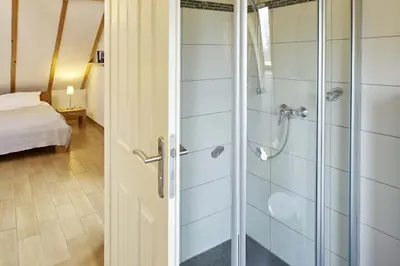 Ein Badezimmer in der Unterkunft Fliederhaus