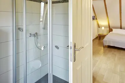 Ein Bett oder Betten in einem Zimmer der Unterkunft Holunderhaus