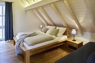 Ein Bett oder Betten in einem Zimmer der Unterkunft Hexenhaus