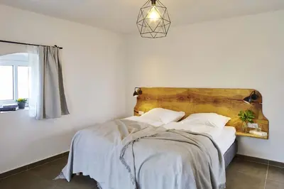 Ein Bett oder Betten in einem Zimmer der Unterkunft Hexenhaus