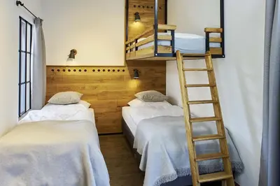 Ein Bett oder Betten in einem Zimmer der Unterkunft Tenne