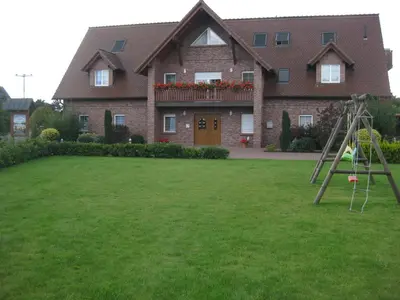 Ein Kinderspielbereich in der Unterkunft Haus Schwielochsee