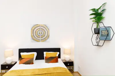Ein Bett oder Betten in einem Zimmer der Unterkunft Great Central City Apartments Mitte Museumsinsel