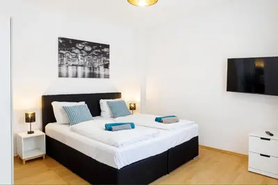 Ein Bett oder Betten in einem Zimmer der Unterkunft Great Central City Apartments Mitte Museumsinsel