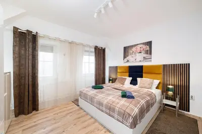 Ein Bett oder Betten in einem Zimmer der Unterkunft Great Central City Apartments Mitte Museumsinsel