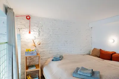Ein Bett oder Betten in einem Zimmer der Unterkunft Architektur Wohnung in Mitte - Brunnenstr