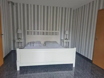 Ein Bett oder Betten in einem Zimmer der Unterkunft Haus am See in Königs Wusterhausen