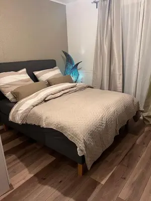 Ein Bett oder Betten in einem Zimmer der Unterkunft charmanter Auszeit