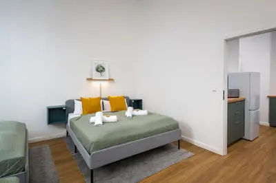 Ein Bett oder Betten in einem Zimmer der Unterkunft Im Herzen von Kreuzberg - perfekt gelegen für bis zu 8 Personen