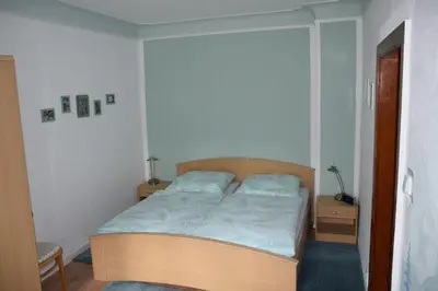 Ein Bett oder Betten in einem Zimmer der Unterkunft Maaß'ens Ferienhaus