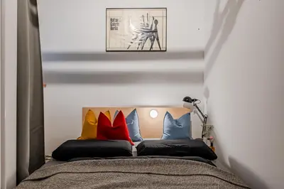 Ein Bett oder Betten in einem Zimmer der Unterkunft Architecture Apartment in Kreuzberg