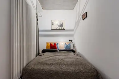 Ein Bett oder Betten in einem Zimmer der Unterkunft Architecture Apartment in Kreuzberg