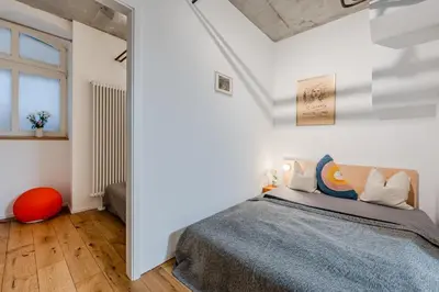 Ein Bett oder Betten in einem Zimmer der Unterkunft Architecture Apartment in Kreuzberg