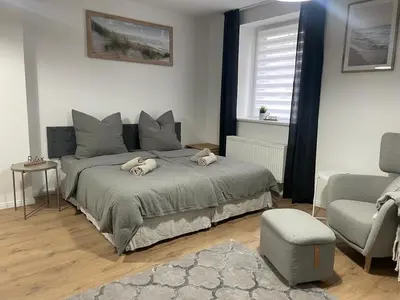 Ein Bett oder Betten in einem Zimmer der Unterkunft Apartment 1 am Werlsee, Grünheide