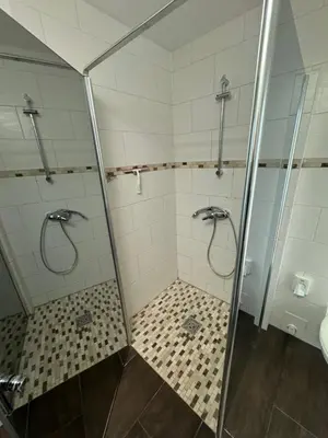 Ein Badezimmer in der Unterkunft SkyPension