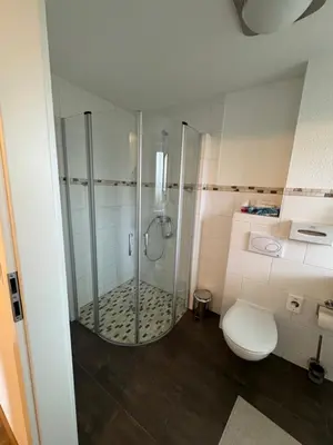 Ein Badezimmer in der Unterkunft SkyPension