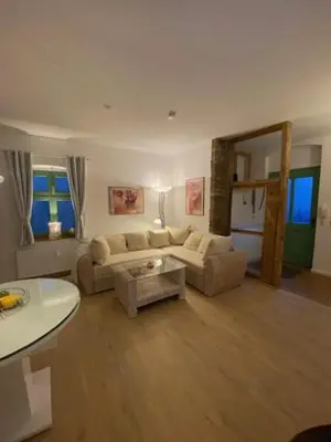 Ein Sitzbereich in der Unterkunft Eisern Home 1