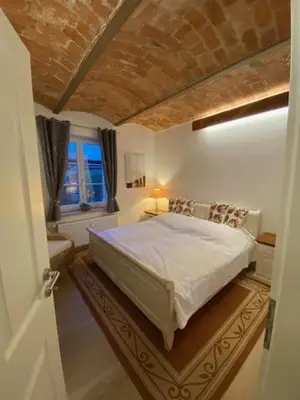 Ein Bett oder Betten in einem Zimmer der Unterkunft Eisern Home 1