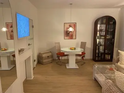 Ein Sitzbereich in der Unterkunft Eisern Home 1